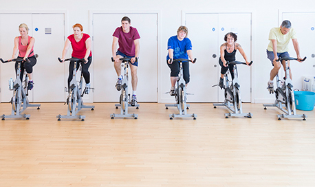 A busy spin class in session in the 69传媒 sports centre